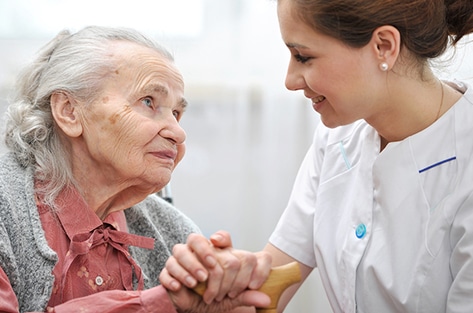 Woman with Caregiver: Home Care Focus: Reducing Hospital Readmissions